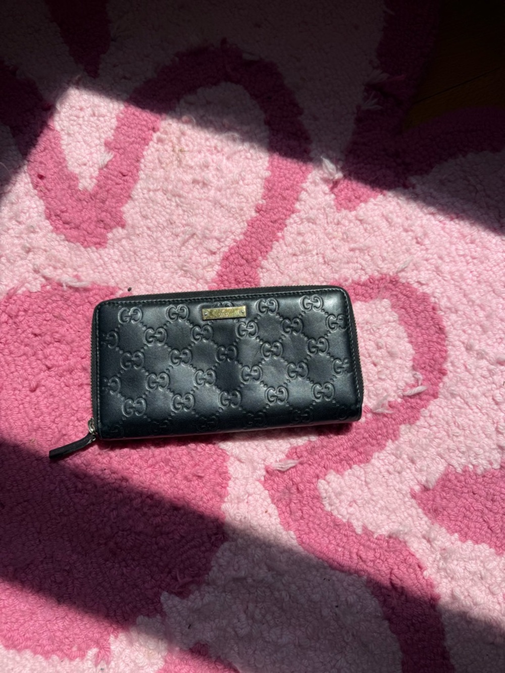 Authentic Gucci Black Embossed GG Zip-Around Leather Wallet
